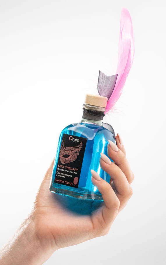 Масло за масажа со загревачки ефект и вкус на шеќерна волна 100ml. (со маслото го добивате и пердувот) SKU: OG-21333 - Image 2